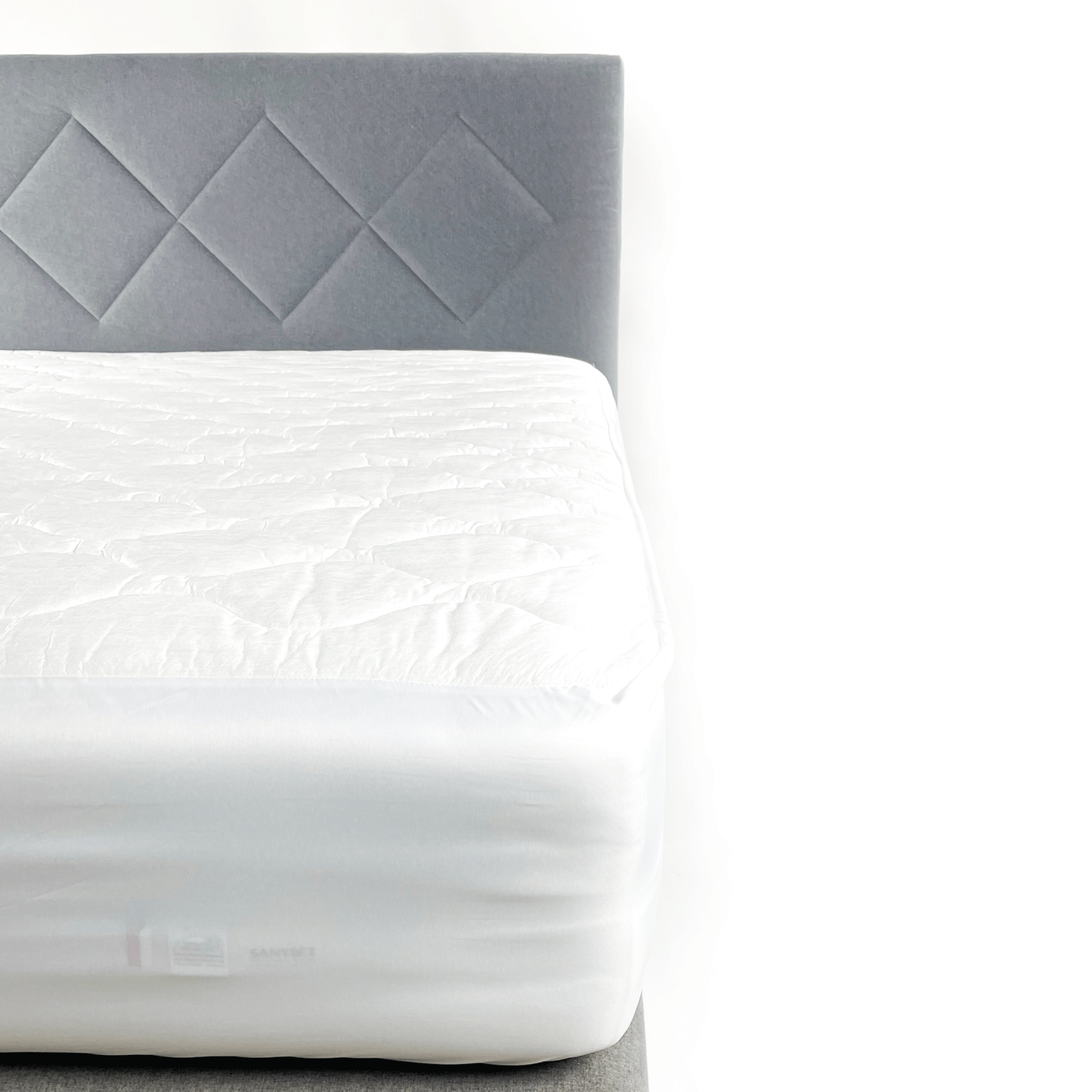 a mattress cover on a bed